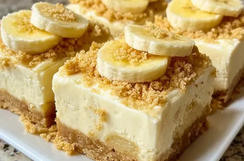 Banana pudding cheesecake squares dessert slice on a plate