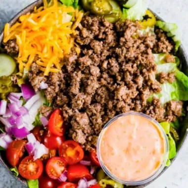 Healthy burger bowls filled with fresh vegetables and lean proteins