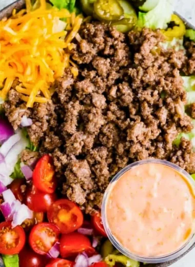 Healthy burger bowls filled with fresh vegetables and lean proteins