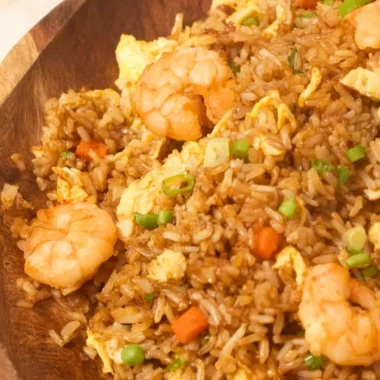 Plate of homemade Chinese shrimp fried rice with vegetables