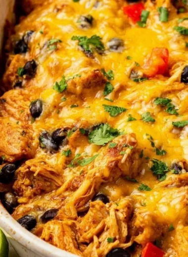 Delicious Mexican Chicken Casserole topped with cheese and spices.