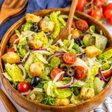 A vibrant and fresh simple Italian salad with tomatoes, mozzarella, and basil