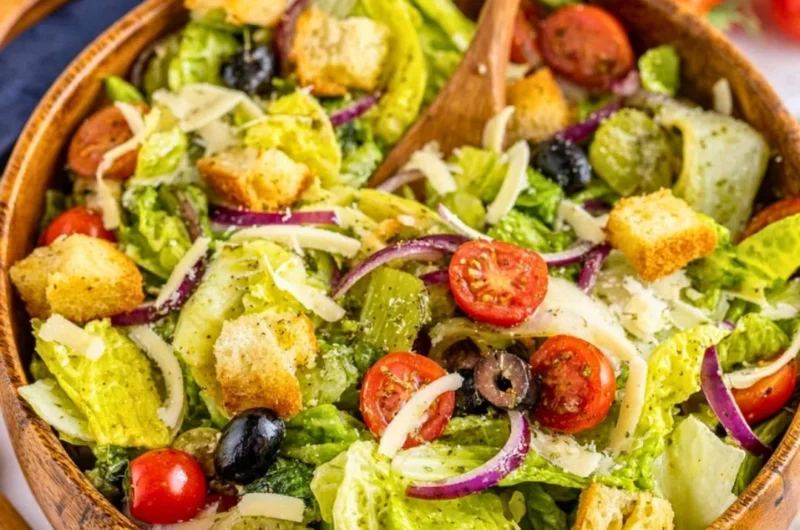 A vibrant and fresh simple Italian salad with tomatoes, mozzarella, and basil