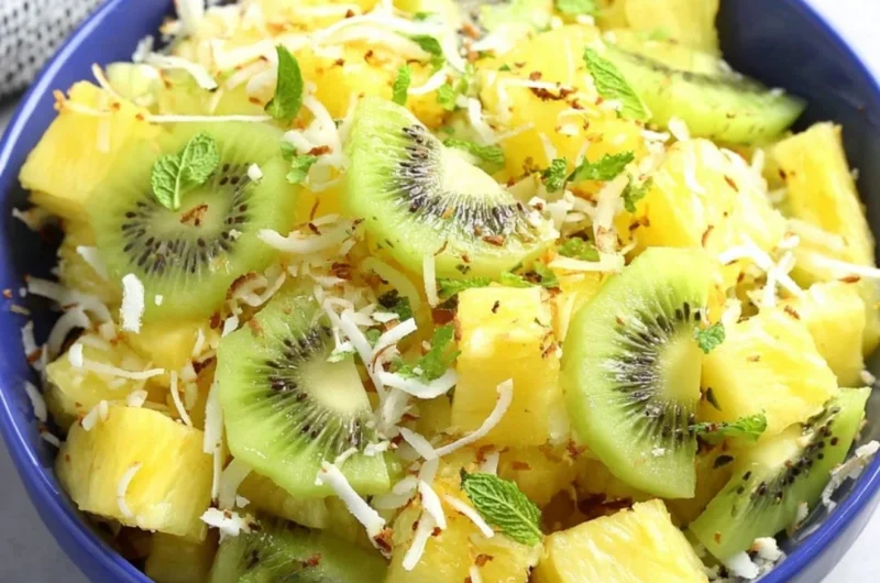A refreshing Pineapple Kiwi Salad with vibrant colors and fresh ingredients.