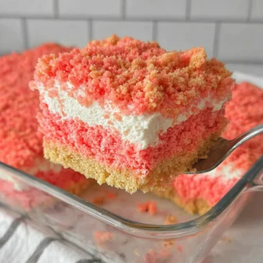 Delicious strawberry crunch cake with layers of strawberries and cream