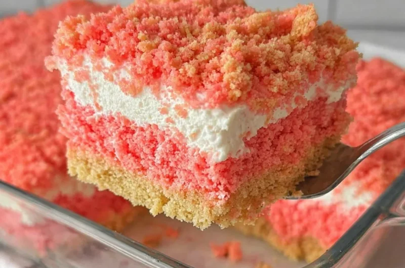 Delicious strawberry crunch cake with layers of strawberries and cream