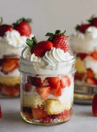 Delicious strawberry shortcake trifles layered with fresh berries and cream