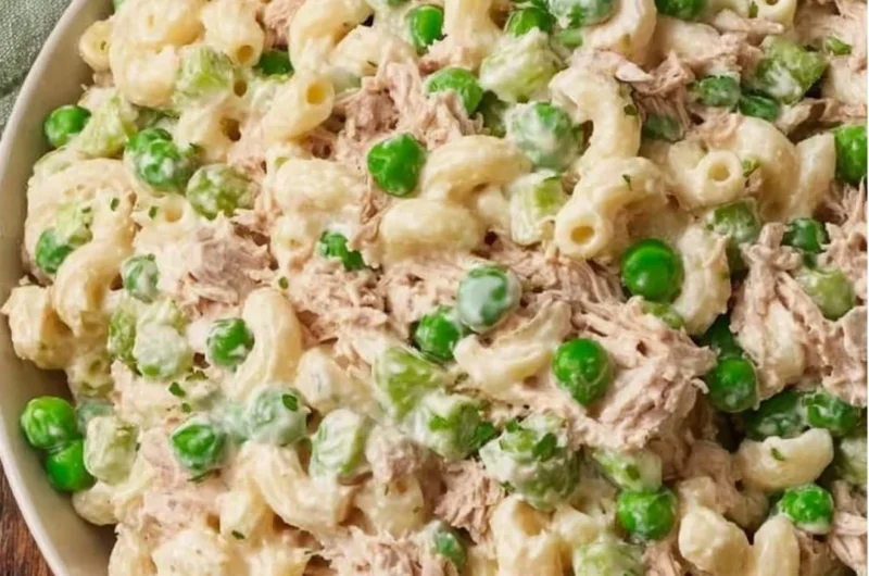Bowl of refreshing Tuna Pasta Salad with vegetables and dressing