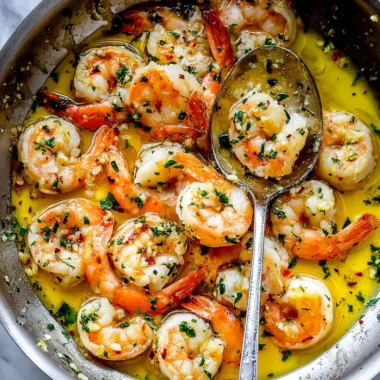 Delicious shrimp scampi with garlic, butter, and parsley served over pasta
