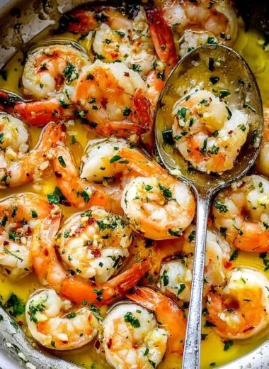 Delicious shrimp scampi with garlic, butter, and parsley served over pasta