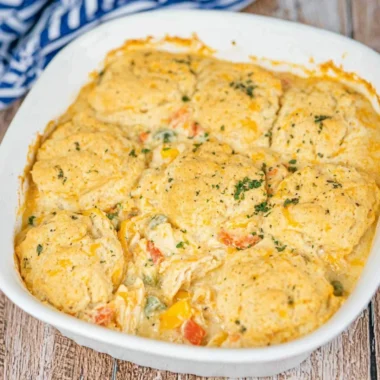 Cheddar Bay Chicken Pot Pie Casserole garnished with herbs in a rustic dish