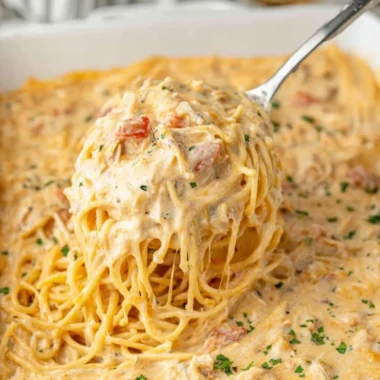 Delicious cheesy casserole bubbling in a baking dish, ready to serve.