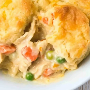Delicious Chicken Cobbler served in a dish, topped with a golden crust.