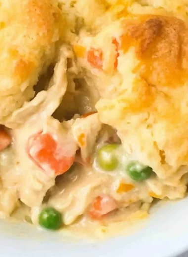 Delicious Chicken Cobbler served in a dish, topped with a golden crust.