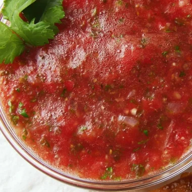 Bowl of easy homemade salsa made with fresh tomatoes and ingredients