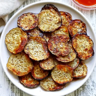 Crispy homemade eggplant chips served in a bowl