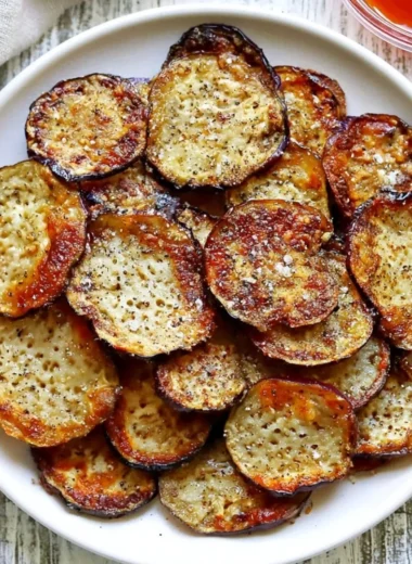 Crispy homemade eggplant chips served in a bowl