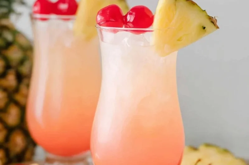 Malibu Bay Breeze cocktail with coconut rum and fruit garnishes in a glass