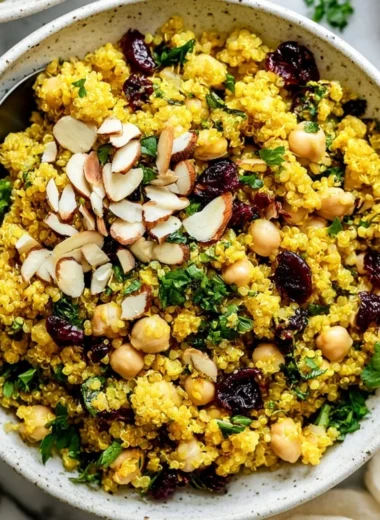 Moroccan-inspired chickpea quinoa salad with fresh vegetables and spices