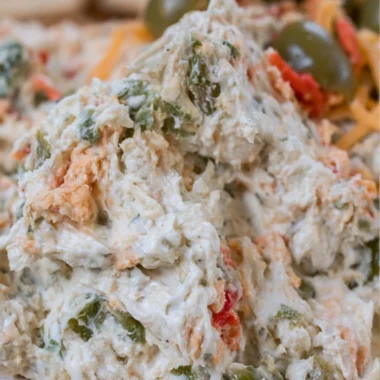 Homemade olive dip served with pita bread and vegetables