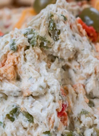 Homemade olive dip served with pita bread and vegetables