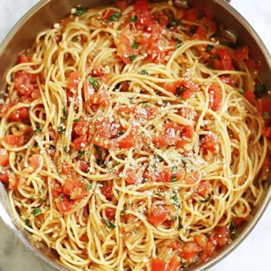 Delicious one-pot pasta dish served with fresh herbs and cheese.
