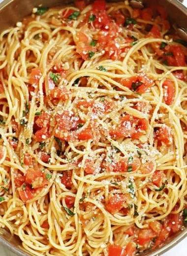 Delicious one-pot pasta dish served with fresh herbs and cheese.