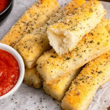 Delicious quick and easy sheet pan breadsticks fresh out of the oven.