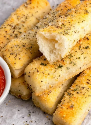 Delicious quick and easy sheet pan breadsticks fresh out of the oven.