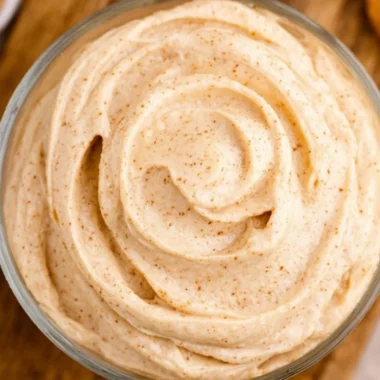 Delicious Texas Roadhouse cinnamon butter spread on warm bread rolls