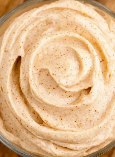 Delicious Texas Roadhouse cinnamon butter spread on warm bread rolls