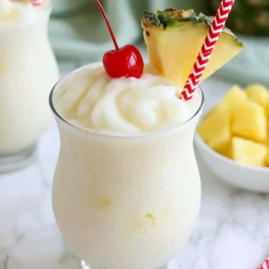 Refreshing virgin pina colada mocktail served in a tropical setting