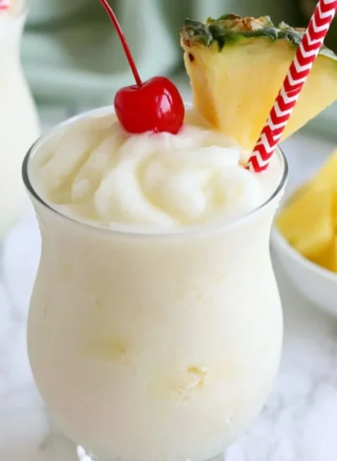 Refreshing virgin pina colada mocktail served in a tropical setting