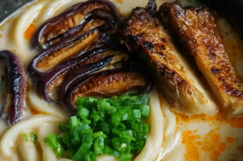 Cozy miso udon noodle soup with teriyaki mushrooms in a bowl