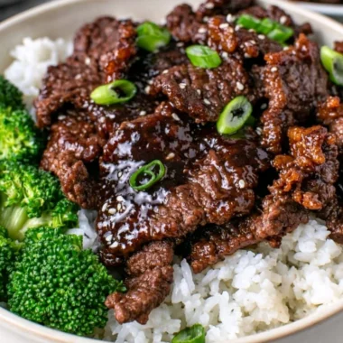 Plate of Easy Mongolian Beef with green onions and rice