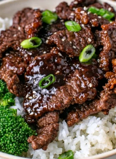 Plate of Easy Mongolian Beef with green onions and rice
