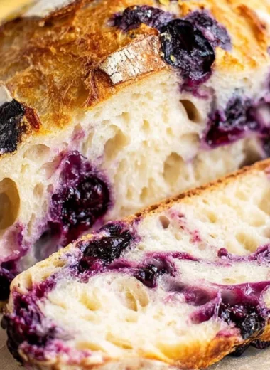 Freshly baked Lemon Blueberry Sourdough Bread with lemon and blueberries