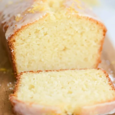 Delicious sourdough discard lemon cake with a golden crust and frosting.