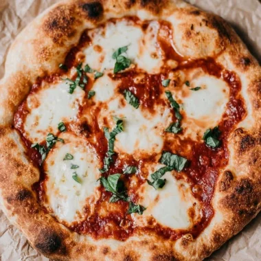 Delicious homemade sourdough pizza crust topped with fresh ingredients