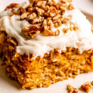 Healthy Protein Pumpkin Baked Oatmeal in a bowl with pumpkin seeds
