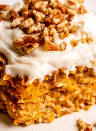 Healthy Protein Pumpkin Baked Oatmeal in a bowl with pumpkin seeds