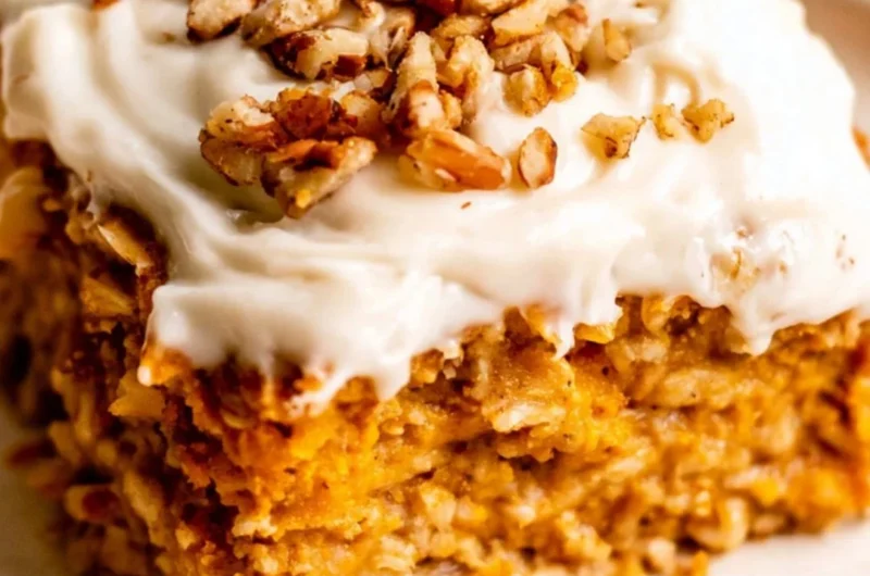 Healthy Protein Pumpkin Baked Oatmeal in a bowl with pumpkin seeds